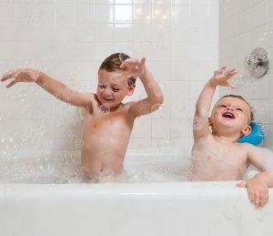 Boys in Tub Playing with Bubbles